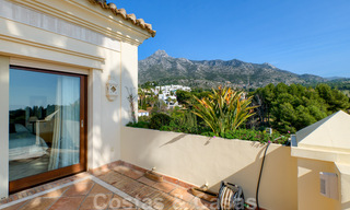 Luxury villa for sale in a classic Mediterranean style with lovely sea views in a gated community on the Golden Mile, Marbella 33047 