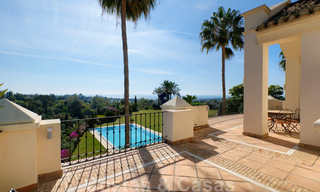 Luxury villa for sale in a classic Mediterranean style with lovely sea views in a gated community on the Golden Mile, Marbella 33049 