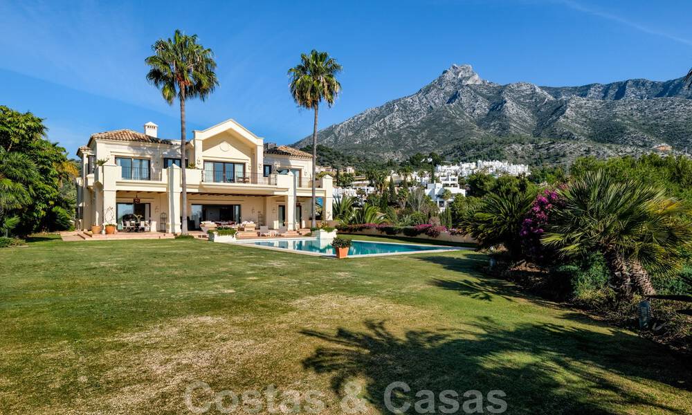 Two side-by-side luxury villas for sale on one property built in a classic Mediterranean style with stunning panoramic sea views in a gated community on the Golden Mile, Marbella 33052