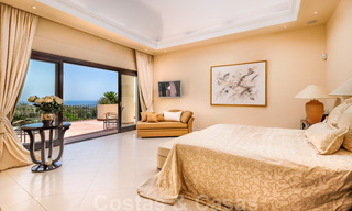 Two side-by-side luxury villas for sale on one property built in a classic Mediterranean style with stunning panoramic sea views in a gated community on the Golden Mile, Marbella 33086 