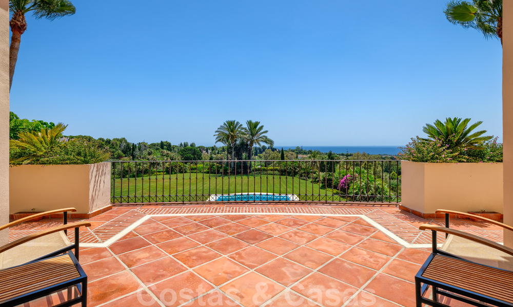 Two side-by-side luxury villas for sale on one property built in a classic Mediterranean style with stunning panoramic sea views in a gated community on the Golden Mile, Marbella 33088