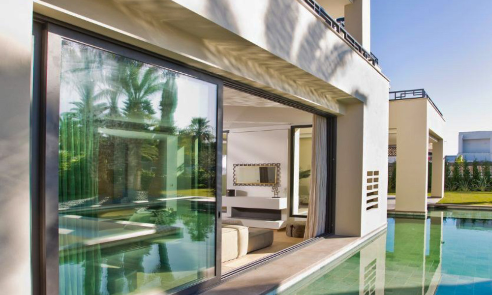 Ready to move in, beachside, contemporary Andalusian designer-style villa for sale, Marbella - Estepona East 33450