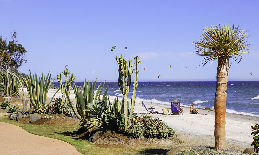 Frontline beach luxury garden flat for sale in an exclusive complex between Marbella and Estepona 34215