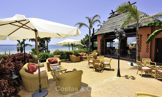 Frontline beach luxury garden flat for sale in an exclusive complex between Marbella and Estepona 34216 