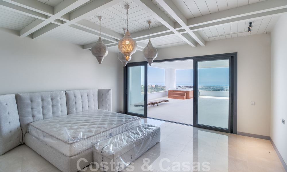 Exclusive and high-tech modern style villa with panoramic sea views for sale, in a prestigious urbanization in Benahavis - Marbella. Completed. 34380