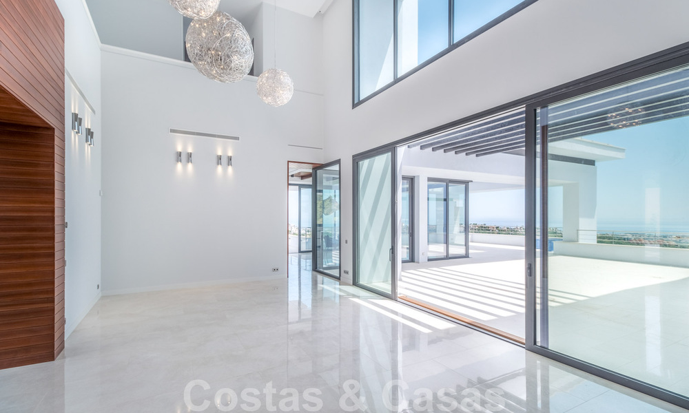 Exclusive and high-tech modern style villa with panoramic sea views for sale, in a prestigious urbanization in Benahavis - Marbella. Completed. 34385