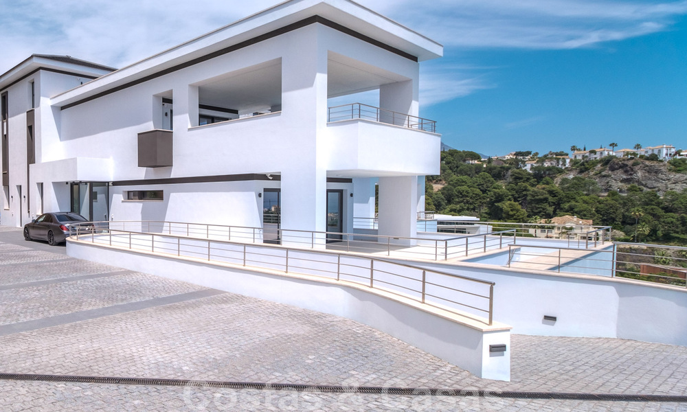 Exclusive and high-tech modern style villa with panoramic sea views for sale, in a prestigious urbanization in Benahavis - Marbella. Completed. 34390