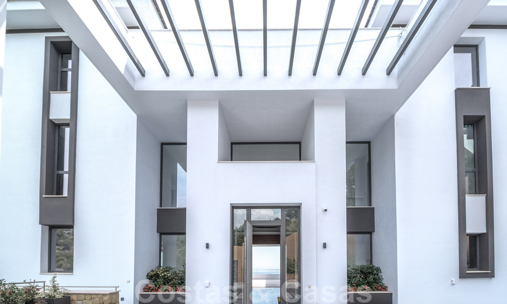 Exclusive and high-tech modern style villa with panoramic sea views for sale, in a prestigious urbanization in Benahavis - Marbella. Completed. 34394