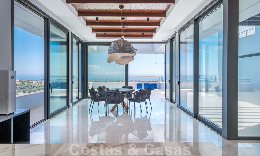 Exclusive and high-tech modern style villa with panoramic sea views for sale, in a prestigious urbanization in Benahavis - Marbella. Completed. 34404
