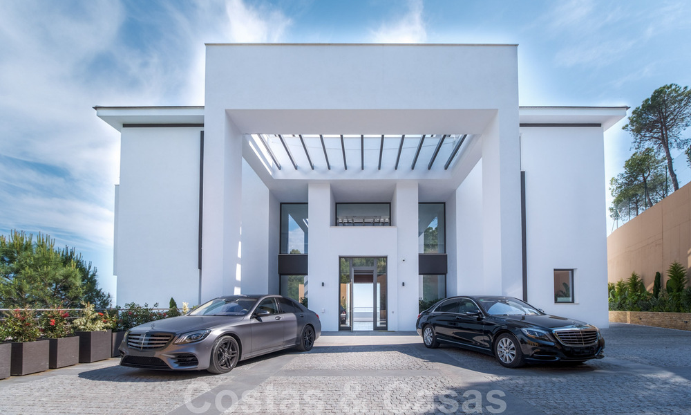 Exclusive and high-tech modern style villa with panoramic sea views for sale, in a prestigious urbanization in Benahavis - Marbella. Completed. 34432
