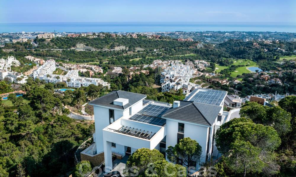 Exclusive and high-tech modern style villa with panoramic sea views for sale, in a prestigious urbanization in Benahavis - Marbella. Completed. 34435