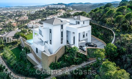 Exclusive and high-tech modern style villa with panoramic sea views for sale, in a prestigious urbanization in Benahavis - Marbella. Completed. 34436