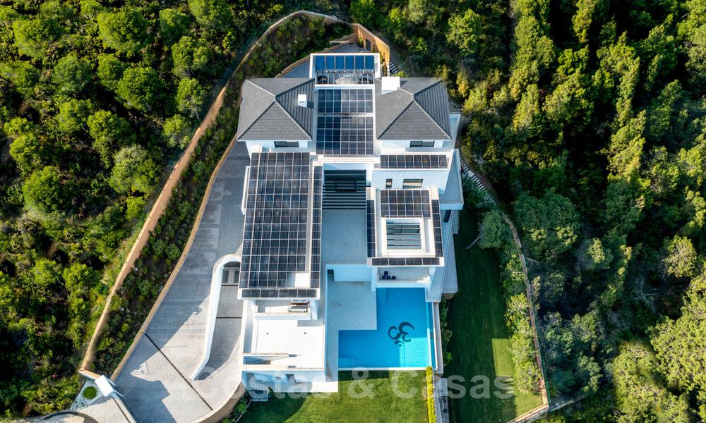 Exclusive and high-tech modern style villa with panoramic sea views for sale, in a prestigious urbanization in Benahavis - Marbella. Completed. 34438