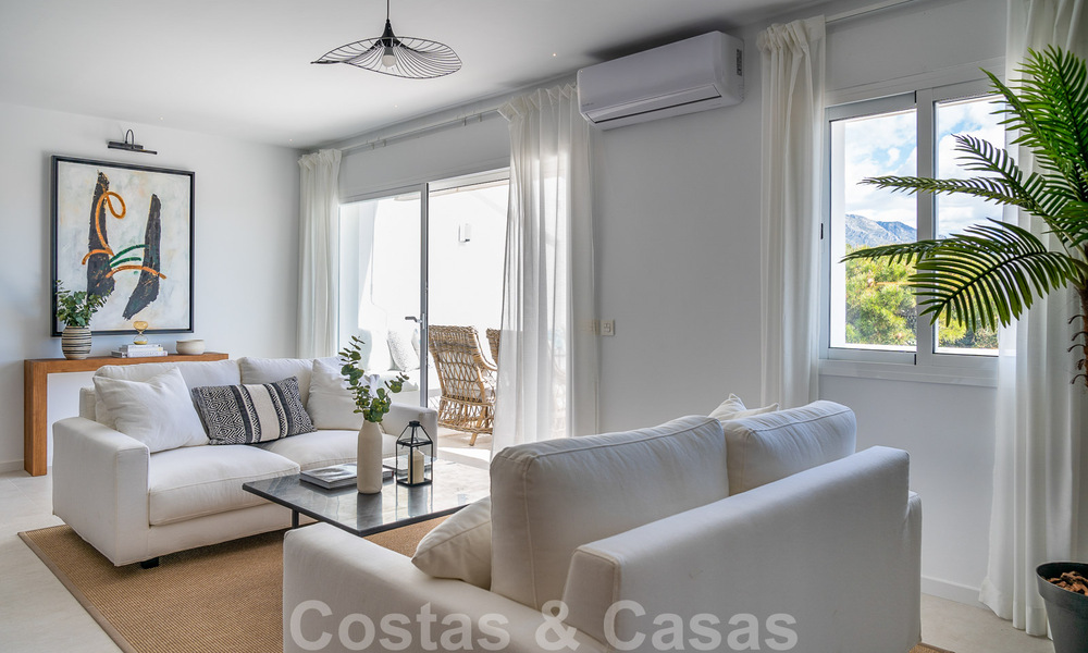 Tastefully renovated apartment for sale with spacious terrace, sea and mountain views in La Quinta golf resort, Benahavis - Marbella 34838