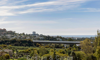 Contemporary renovated apartment for sale with spacious terrace, sea and mountain views in La Quinta golf resort, Benahavis - Marbella 34853 