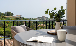 Contemporary renovated apartment for sale with spacious terrace, sea and mountain views in La Quinta golf resort, Benahavis - Marbella 34854 