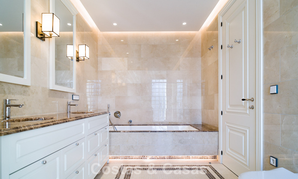 Luxury villa for sale in a contemporary classic style with sea views in a five star golf resort in Marbella - Benahavis 775501