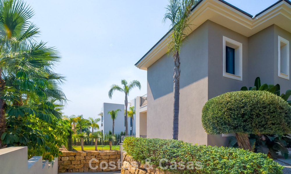 Luxury villa for sale in a contemporary classic style with sea views in a five star golf resort in Marbella - Benahavis 775509