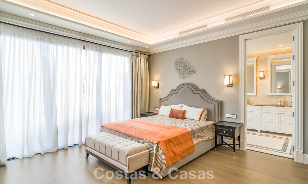 Luxury villa for sale in a contemporary classic style with sea views in a five star golf resort in Marbella - Benahavis 775517