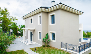 Newly built villa for sale in a contemporary classic style with sea views in a five star golf resort in Marbella - Benahavis 34929 