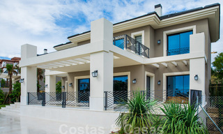 Newly built villa for sale in a contemporary classic style with sea views in a five star golf resort in Marbella - Benahavis 34945 