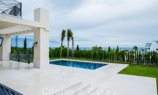 Newly built villa for sale in a contemporary classic style with sea views in a five star golf resort in Marbella - Benahavis 34947 