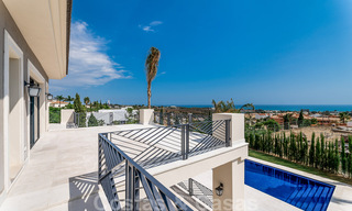 Newly built villa for sale in a contemporary classic style with sea views in a five star golf resort in Marbella - Benahavis 34965 