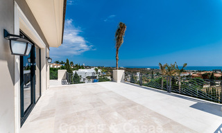 Newly built villa for sale in a contemporary classic style with sea views in a five star golf resort in Marbella - Benahavis 34966 