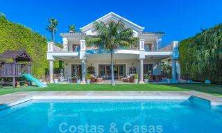 Luxury villa for sale in an exclusive residential area on the beach side of the Golden Mile in Marbella 35046 