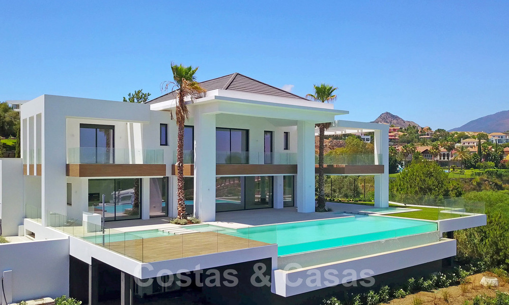 Ready to move in, contemporary modern villa for sale with golf and sea views in a five star golf resort in Marbella - Benahavis 35360