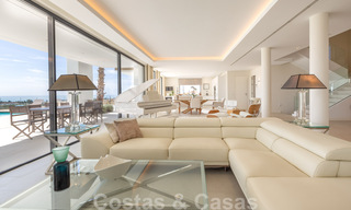 Ready to move in, contemporary modern villa for sale with golf and sea views in a five star golf resort in Marbella - Benahavis 35387 