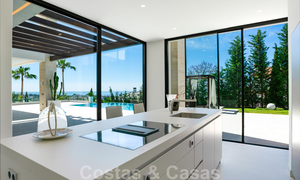 Ready to move in, new modern villa for sale with sea views from all levels in a five star golf resort in Marbella - Benahavis 35721