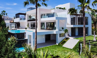 Ready to move in, new modern villa for sale with sea views from all levels in a five star golf resort in Marbella - Benahavis 35722 