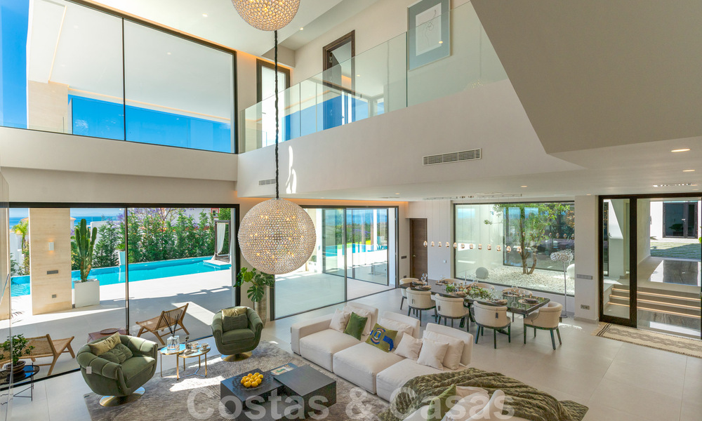 Ready to move in, new modern villa for sale with sea views from all levels in a five star golf resort in Marbella - Benahavis 35735