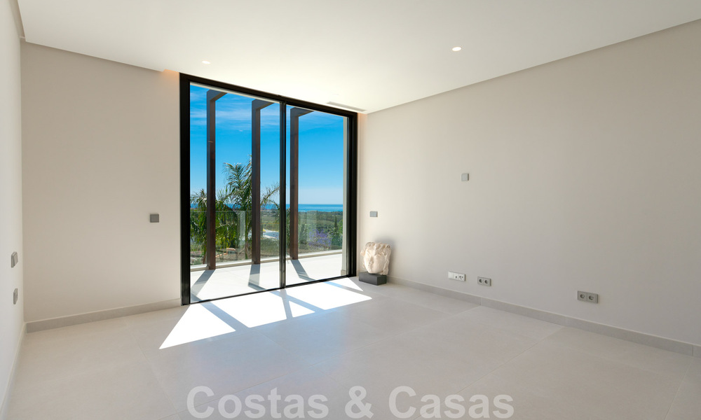 Ready to move in, new modern villa for sale with sea views from all levels in a five star golf resort in Marbella - Benahavis 35736