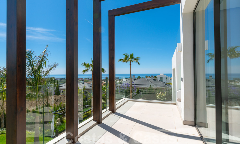 Ready to move in, new modern villa for sale with sea views from all levels in a five star golf resort in Marbella - Benahavis 35737