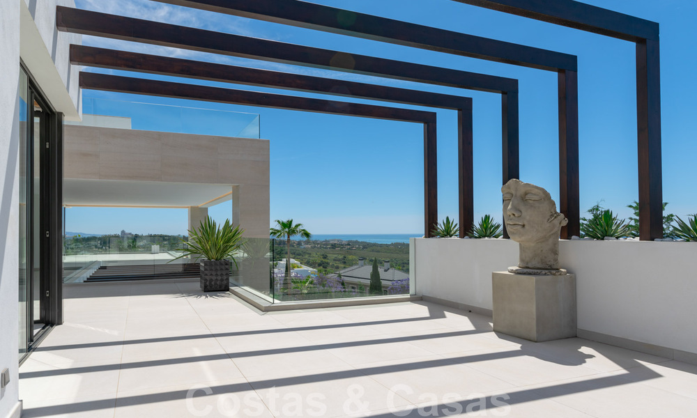 Ready to move in, new modern villa for sale with sea views from all levels in a five star golf resort in Marbella - Benahavis 35749