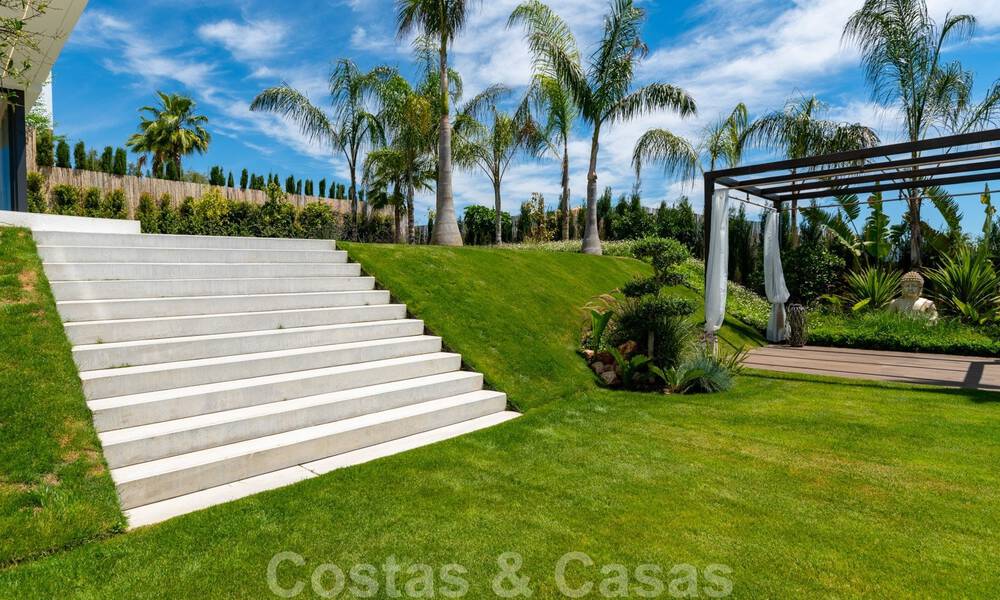 Ready to move in, new modern villa for sale with sea views from all levels in a five star golf resort in Marbella - Benahavis 35762