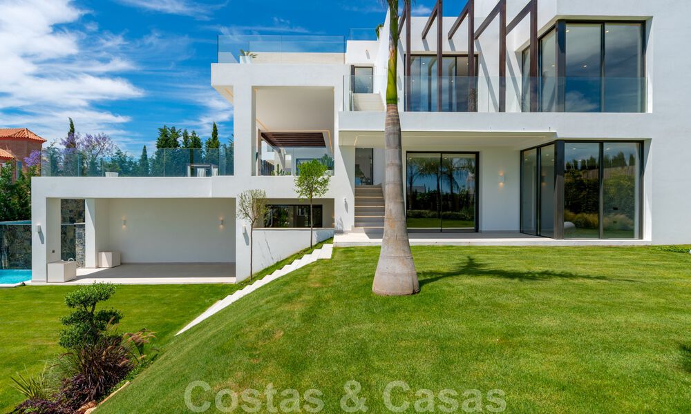 Ready to move in, new modern villa for sale with sea views from all levels in a five star golf resort in Marbella - Benahavis 35764