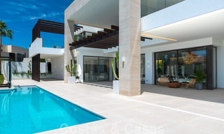 Ready to move in, new modern villa for sale with sea views from all levels in a five star golf resort in Marbella - Benahavis 35766 
