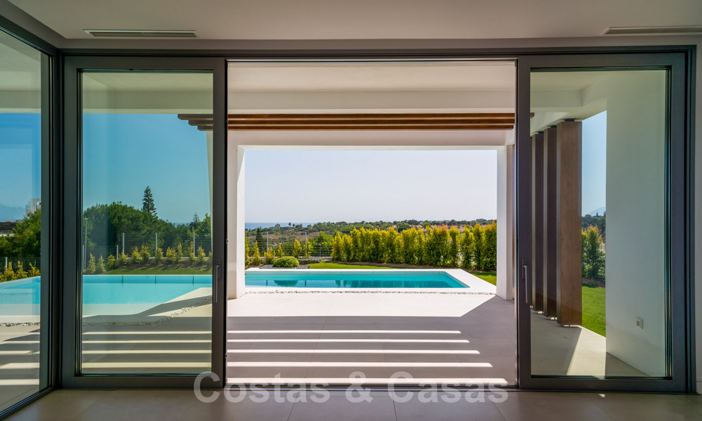 Ready to move in, modern villa in a gated community with stunning sea views for sale in East Marbella 36017