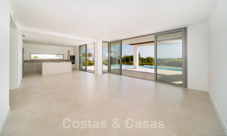 Ready to move in, modern villa in a gated community with stunning sea views for sale in East Marbella 36018 