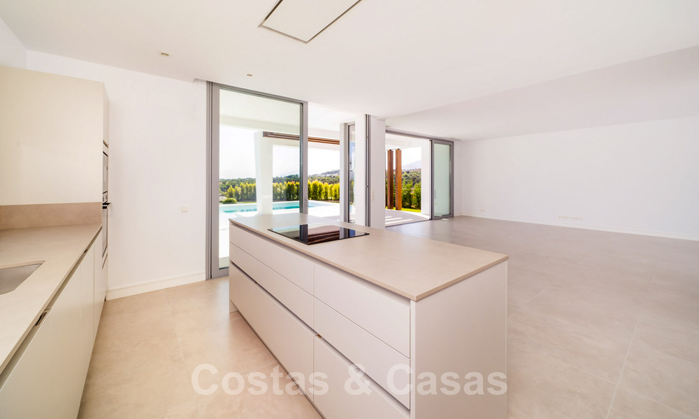 Ready to move in, modern villa in a gated community with stunning sea views for sale in East Marbella 36019