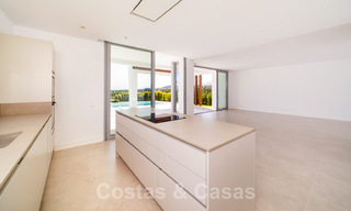 Ready to move in, modern villa in a gated community with stunning sea views for sale in East Marbella 36019 