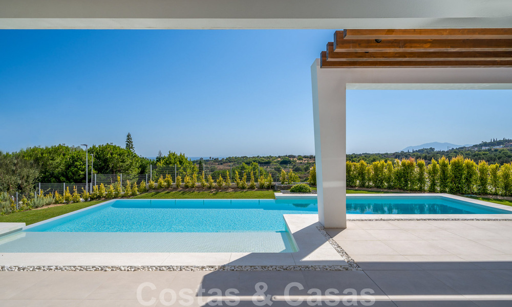 Ready to move in, modern villa in a gated community with stunning sea views for sale in East Marbella 36021