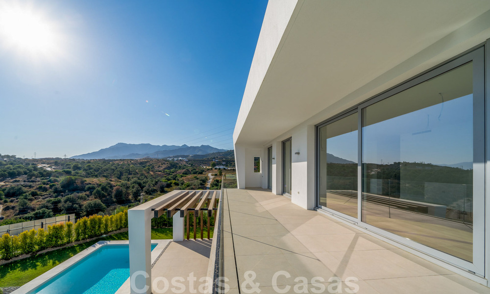 Ready to move in, modern villa in a gated community with stunning sea views for sale in East Marbella 36034