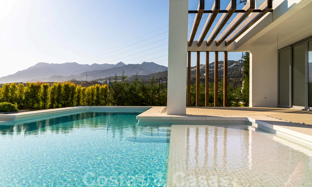 Ready to move in, modern villa in a gated community with stunning sea views for sale in East Marbella 36042