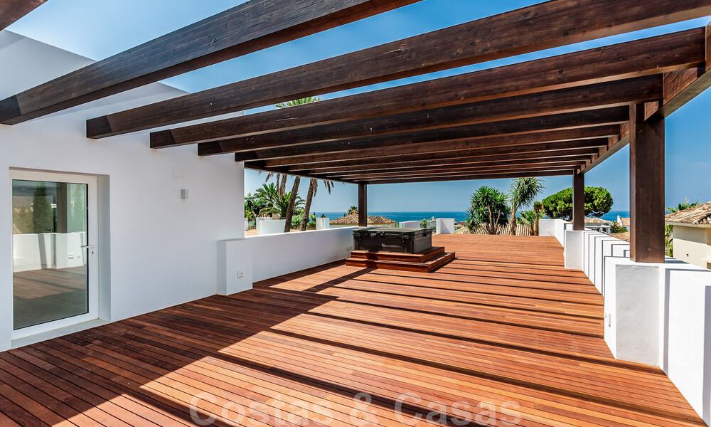 Modern beachside villa for sale in East Marbella with sea views, a stone's throw away from beautiful and cozy beaches 36448