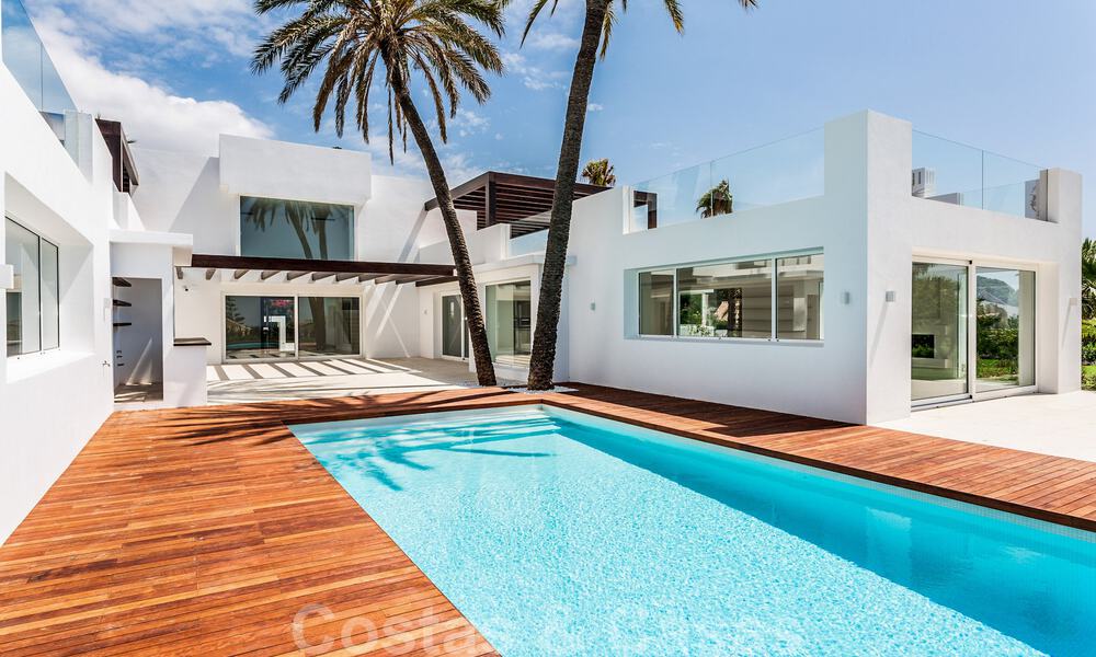 Modern beachside villa for sale in East Marbella with sea views, a stone's throw away from beautiful and cozy beaches 36455