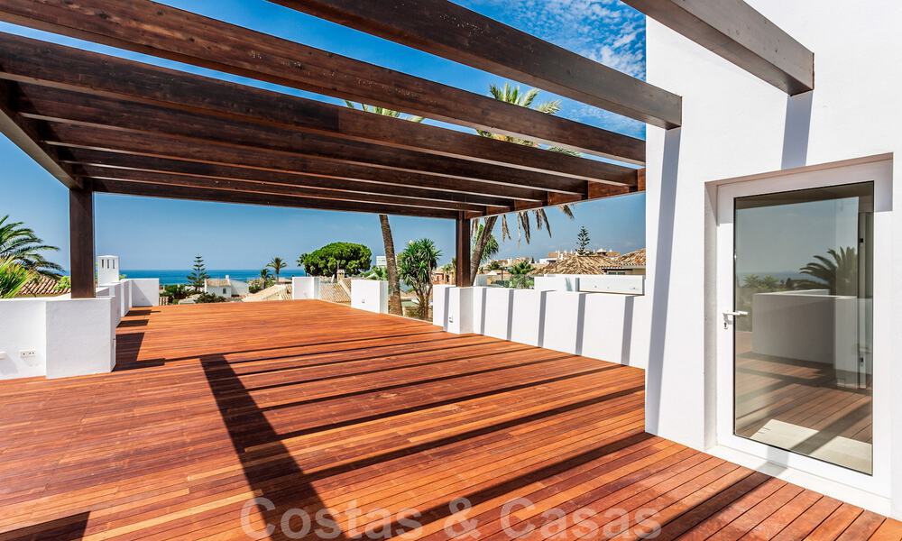 Modern beachside villa for sale in East Marbella with sea views, a stone's throw away from beautiful and cozy beaches 36459